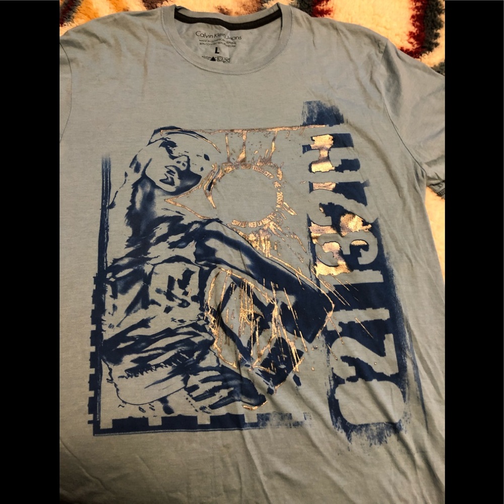Light blue Calvin Klein Tee.